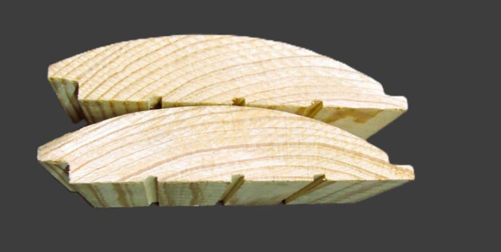 Cross-sectional view of two rounded log-style tongue and groove wood boards, showing interlocking grooves