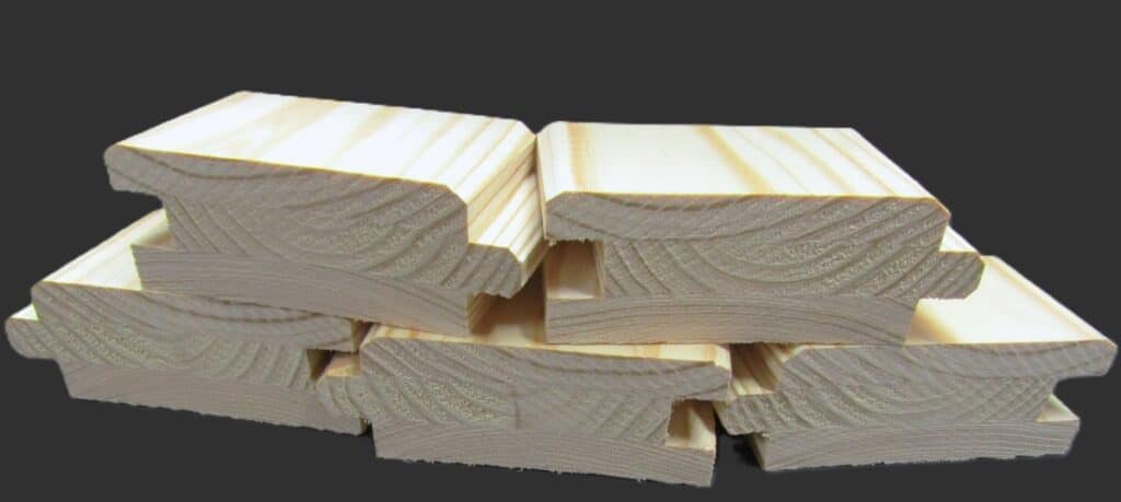 Four pine boards with beveled edges arranged in a square, highlighting the joinery and natural wood grain